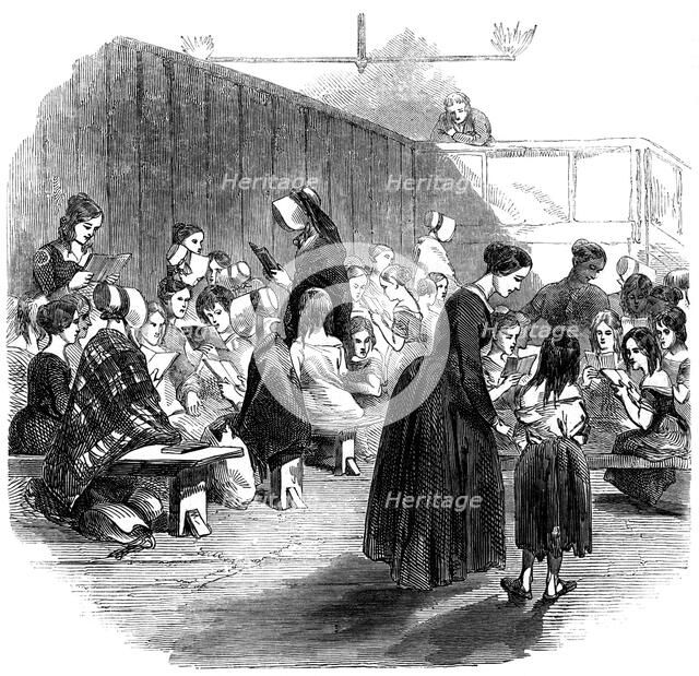 Teaching girls to read in the Ragged School Union school, Lambeth, London, 1868. Artist: Unknown