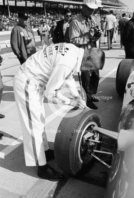 Technician checking tyre wear, Indianapolis, Indiana, USA, 1965. Artist: Unknown