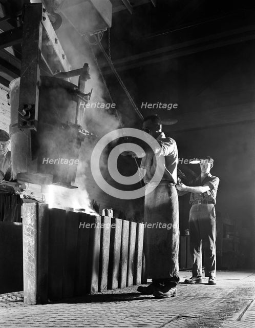 Teeming iron in the Steel City, Sheffield, South Yorkshire, 1963.  Creator: Michael Walters.