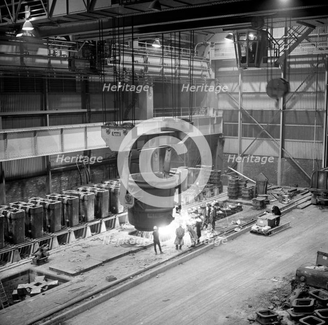 Teeming (pouring) molten iron, Park Gate Iron & Steel Co, Rotherham, South Yorkshire, 1964. Artist: Michael Walters