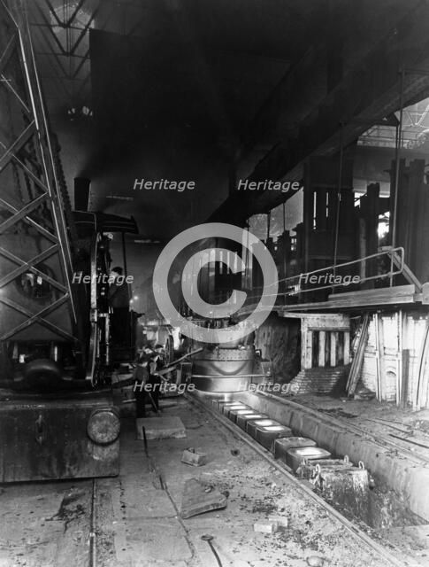 Teeming (pouring) molten steel, Park Gate Iron & Steel Co, Rotherham, South Yorkshire, April 1955. Artist: Michael Walters