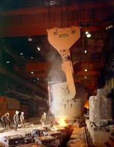 Teeming (pouring) steel ingots, Park Gate Iron and Steel Co, Rotherham, South Yorkshire, 1964. Creator: Michael Walters