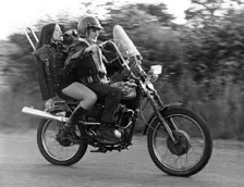 Teenagers on a motobike, Charlwood, Surrey, 1972