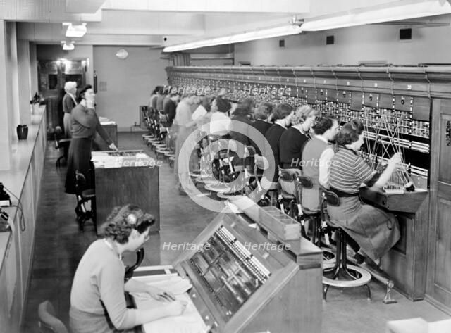 Telephone exchange at Cadley Hall, London, March 1951. Artist: Unknown