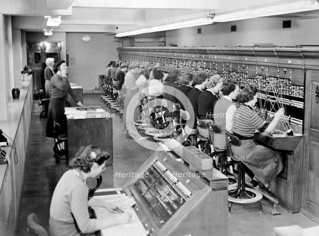Telephone exchange at Cadley Hall, London, March 1951. Creator: Unknown.