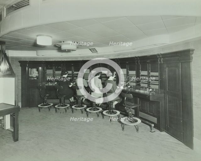 Telephonists at the Fire Brigade Headquarters, Lambeth, London, 1940. Artist: Unknown.