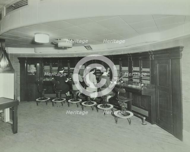 Telephonists at the Fire Brigade Headquarters, Lambeth, London, 1940. Artist: Unknown.