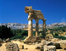 Temple of Diosuri, Agrigento, Sicily, Italy. Agrigento town behind