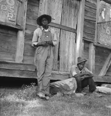Tenant farmer and friend, Chatham County, North Carolina, 1939. Creator: Dorothea Lange