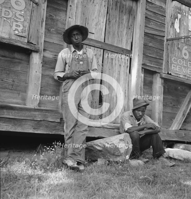 Tenant farmer and friend, Chatham County, North Carolina, 1939. Creator: Dorothea Lange.