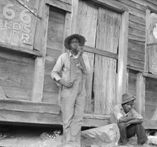 Tenant farmer and friend, Chatham County, North Carolina, 1939. Creator: Dorothea Lange