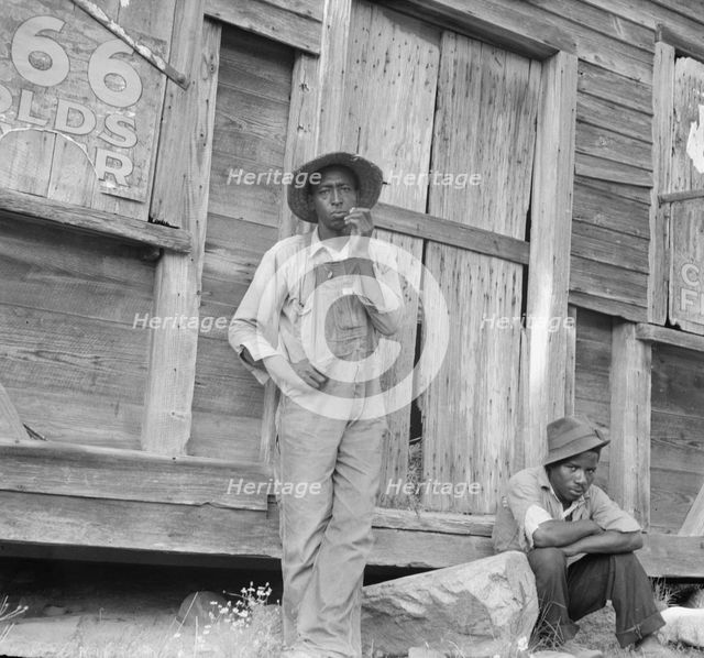 Tenant farmer and friend, Chatham County, North Carolina, 1939. Creator: Dorothea Lange.