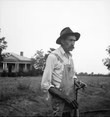 Tenant farmer near Thomaston, Georgia, speaking of the drought, 1936. Creator: Dorothea Lange