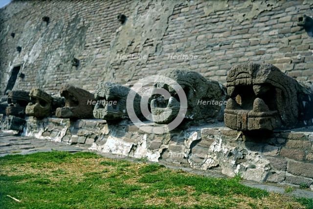 Tenayuca Pyramid, Aztec construction, the below part of the wall has snake heads surrounding the …