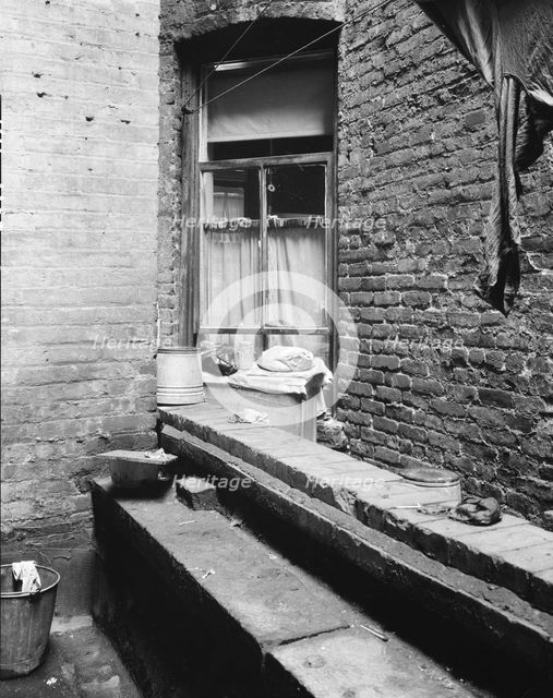 Tenement dwelling of Mr. and Mrs. Jacob Solomon, New York City, 193 Creator: Dorothea Lange.