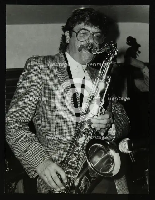 Tenor saxophonist Alan Skidmore playing at The Bell, Codicote, Hertfordshire, 16 November 1986. Creator: Denis Williams.