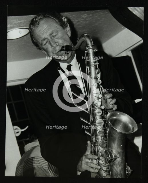 Tenor saxophonist Spike Robinson playing at The Bell, Codicote, Hertfordshire, 11 September 1986. Creator: Denis Williams.