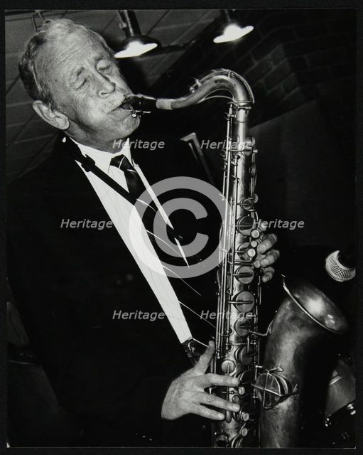 Tenor saxophonist Spike Robinson playing at The Fairway, Welwyn Garden City, Hertfordshire, 1992. Creator: Denis Williams.