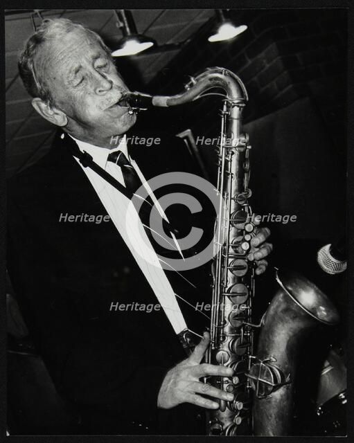 Tenor saxophonist Spike Robinson playing at The Fairway, Welwyn Garden City, Hertfordshire, 1992. Artist: Denis Williams