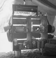 Tent interior in a labor contractor's camp, showing household equipment, near Westley, CA, 1939. Creator: Dorothea Lange
