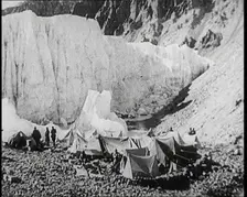 Tents and Groups of Civilians at a Base Camp at the Foot of Mount Everest, 1924. Creator: British Pathe Ltd