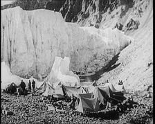 Tents and Groups of Civilians at a Base Camp at the Foot of Mount Everest, 1924. Creator: British Pathe Ltd