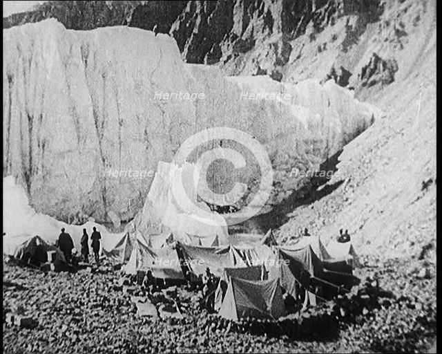 Tents and Groups of Civilians at a Base Camp at the Foot of Mount Everest, 1924. Creator: British Pathe Ltd.