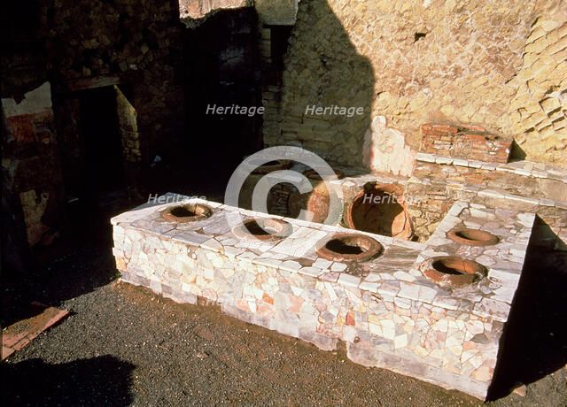 Termopolio ruins, hot food shop, located on Cardo V street, located on the ruins of Herculaneum.