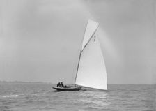Termagent (H9), an early 8 Metre class yacht sails downwind, 1911. Creator: Kirk & Sons of Cowes
