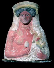 Terracotta bust of Dionysus with common offerings at tombs
