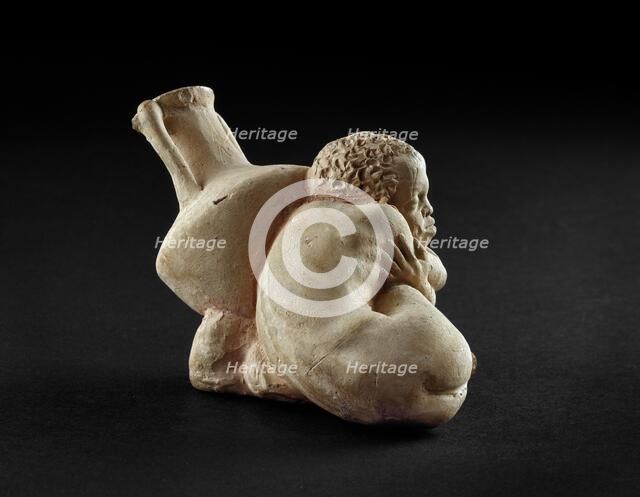 Terracotta figurine of an Afro-Hellenic boy, possibly a slave with Rhodian amphora, 4th century BC. Artist: Unknown.
