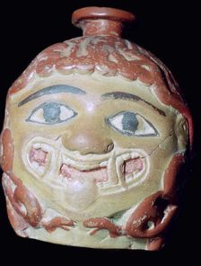 Terracotta Gorgon's head bottle