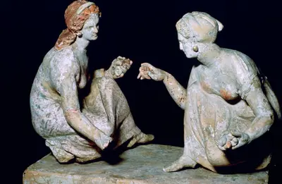 Terracotta group of 'knucklebone' (astragalos) players, Hellenistic Greek, c330-c300 BC. Artist: Unknown