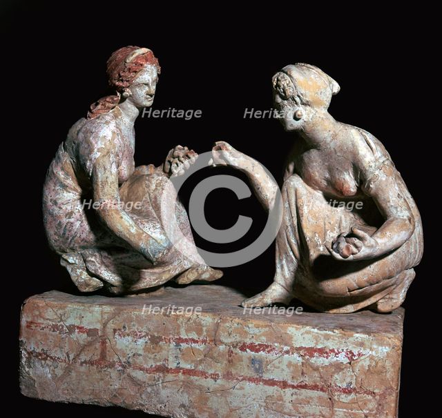 Terracotta group of 'knucklebone' (astragalos) players, Hellenistic Greek, c330-c300 BC. Artist: Unknown