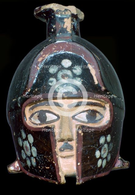 Terracotta scent-bottle in the shape of a helmeted head, Rhodes, Greece, c600-550BC. Artist: Unknown