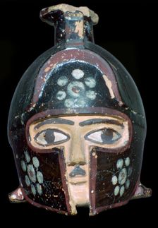 Terracotta scent-bottle in the shape of a helmeted head, Rhodes, Greece, c600-550BC