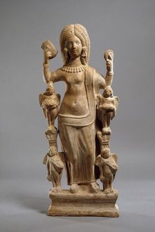 Terracotta statuette of Venus, or a young woman dressed at Venus, at her toilet, c200-230