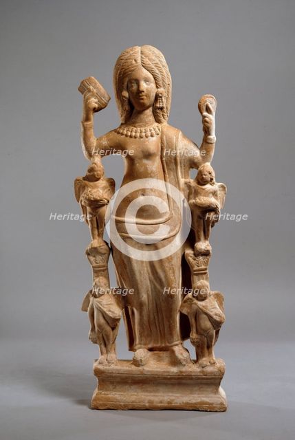 Terracotta statuette of Venus, or a young woman dressed at Venus, at her toilet, c200-230. Artist: Unknown.