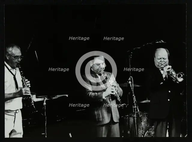 Terry Lightfoot, Peanuts Hucko and Billy Butterfield playing at Potters Bar, Hertfordshire, 1986. Creator: Denis Williams.