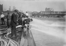 Testing stream from motor fire engines, 1913. Creator: Bain News Service