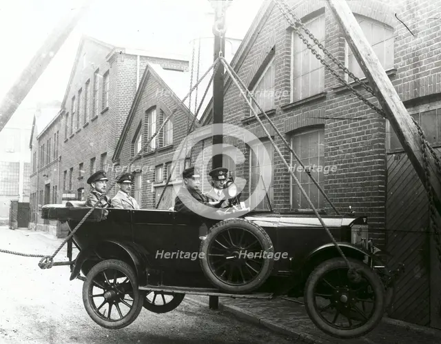 Thulin Type A car suspended from a crane, Landskrona, Sweden, 1923. Creator: Unknown.