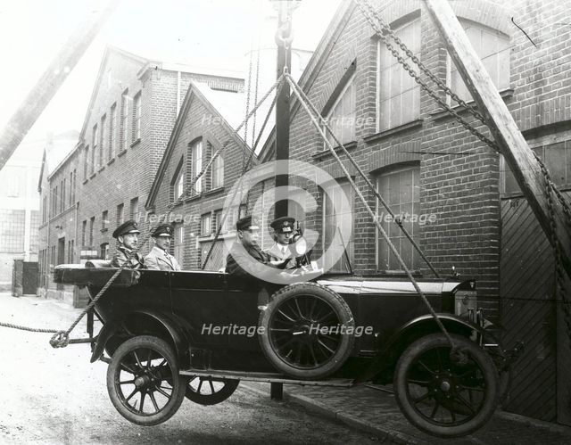 Thulin Type A car suspended from a crane, Landskrona, Sweden, 1923. Creator: Unknown.