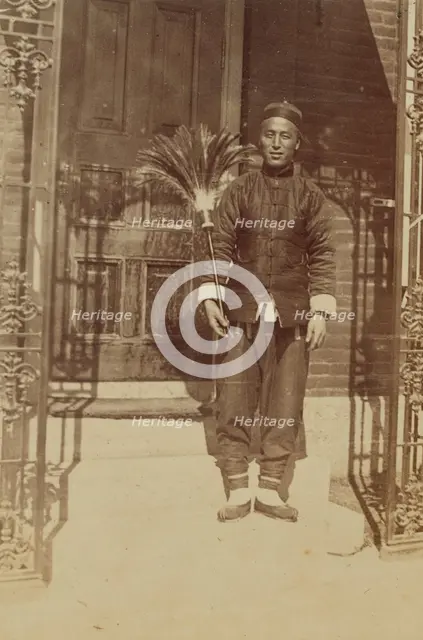 Thune Chin Sin, a Chinese house servant and errand boy, holding feather duster..., 1899. Creator: Eleanor Lord Pray.