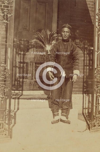 Thune Chin Sin, a Chinese house servant and errand boy, holding feather duster..., 1899. Creator: Eleanor Lord Pray.