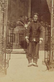 Thune Chin Sin, a Chinese house servant and errand boy, holding feather duster..., 1899. Creator: Eleanor Lord Pray