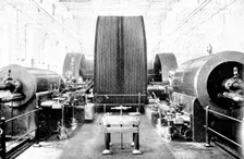 That which "makes the wheels go round": a large engine in an Indian jute-factory, 1909. Creator: Unknown