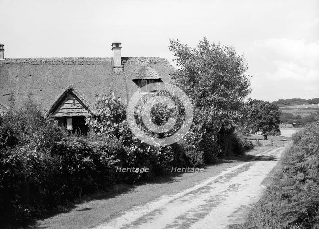 Thatched cottage, c1935. Creator: Kirk & Sons of Cowes.