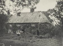Thatched cottage. From the album: Photograph album - England, 1920s. Creator: Harry Moult