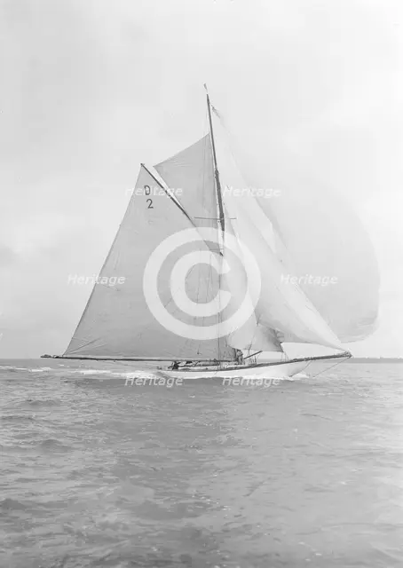 The 15 Metre cutter 'Ostara' broad reaching, 1912. Creator: Kirk & Sons of Cowes.