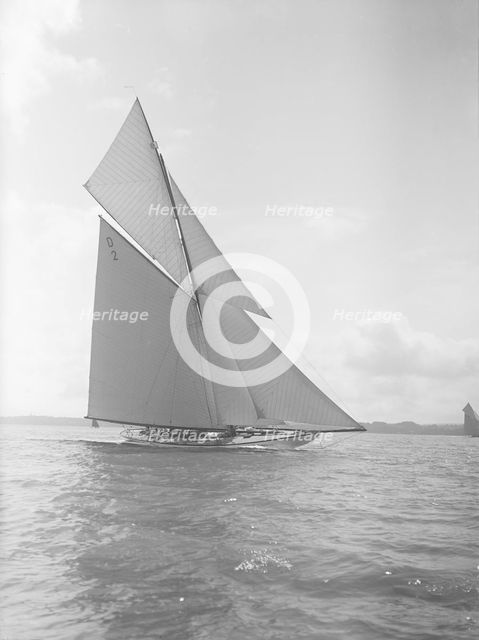 The 15-metre cutter 'Ostara' sailing close-hauled, 1911. Creator: Kirk & Sons of Cowes.